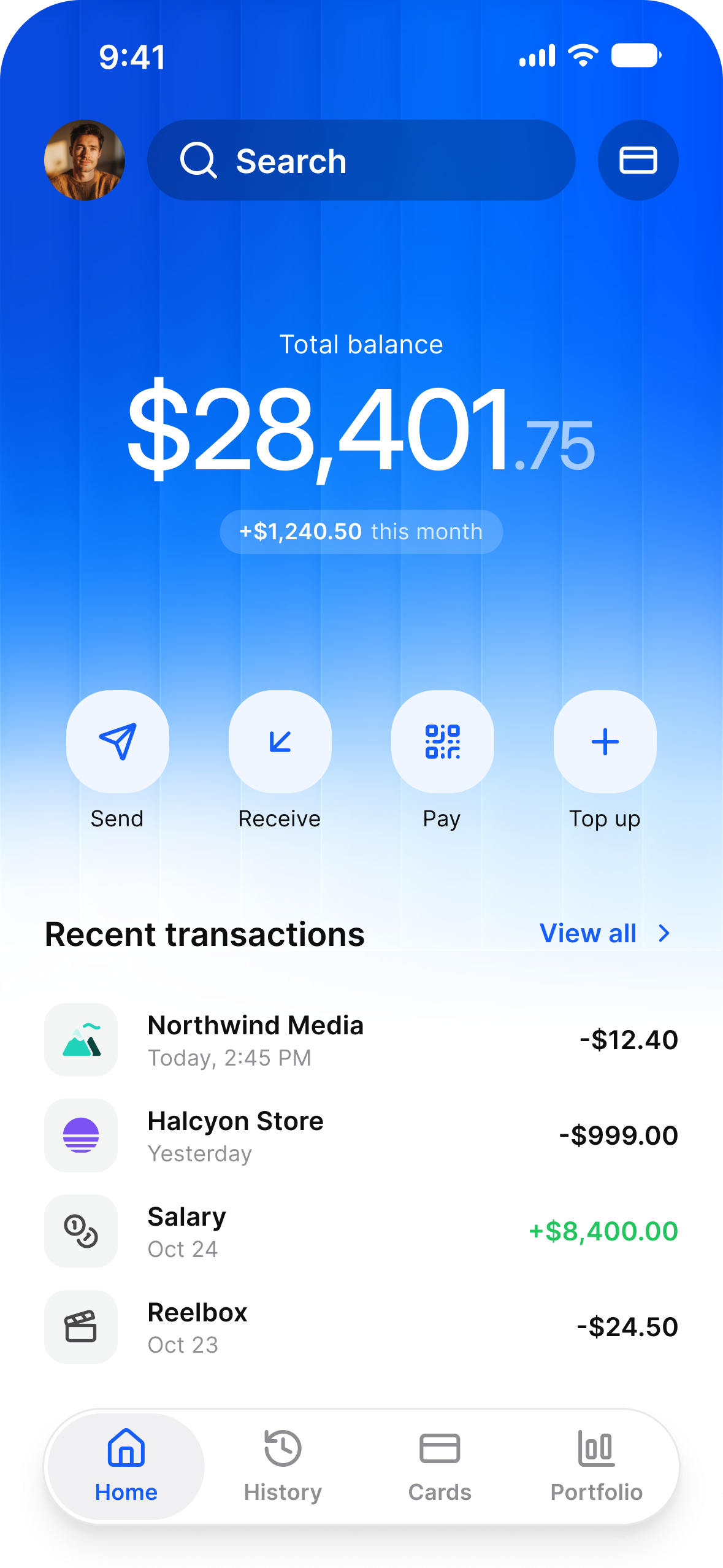 Finance app home in light mode: a total balance with its change this month, Send, Receive, Pay and Top up, and recent transactions