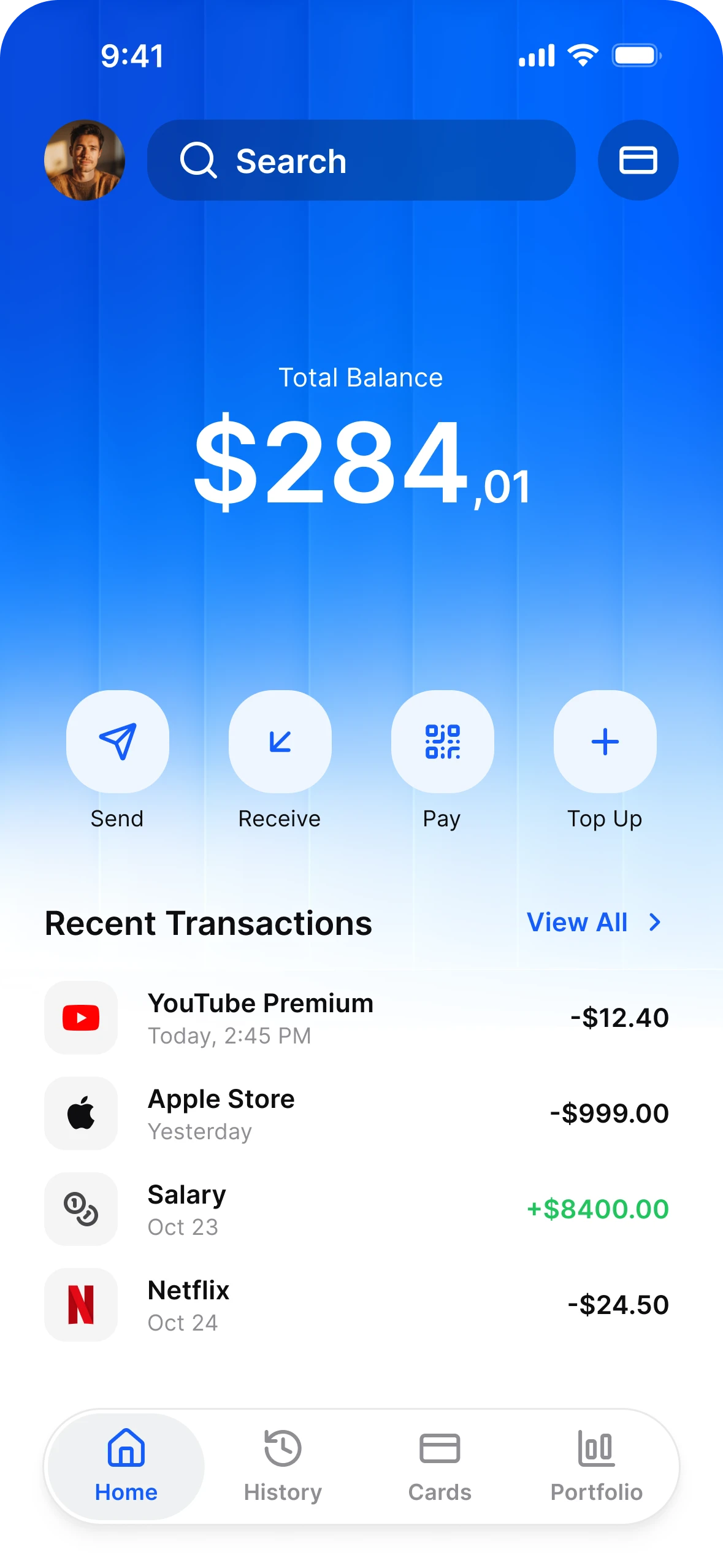 Finance app home in light mode: a total balance card, Send, Receive, Pay and Top Up, and recent transactions